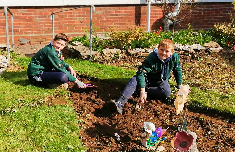 SCOUTS PROMISE TO DO THEIR GARDENING DUTY