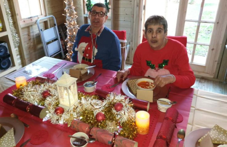 Residents at Westgate sitting down to dinner at the cabin restaurant.