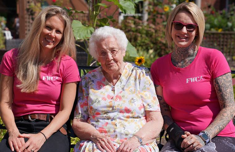 Heather (left) and Steph, from Forces Wives Challenge, visited Royal Star & Garter in Solihull, where they met residents including Sue, who climbed Pen y Fan in 1949. (Image credit: Royal Star & Garter)