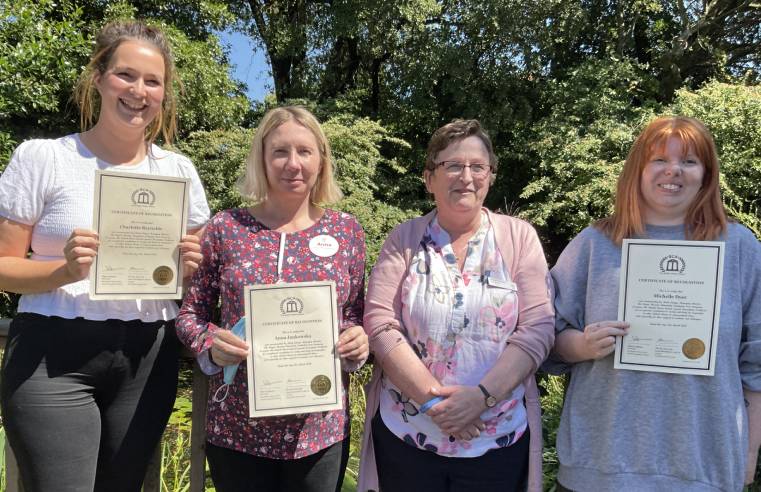  Photo: From left to right, staff members Charlotte Reynolds, Anna Janakowska, Deidre Johnson (Home Manager) and Michelle Dyer holding their BCA certificates.